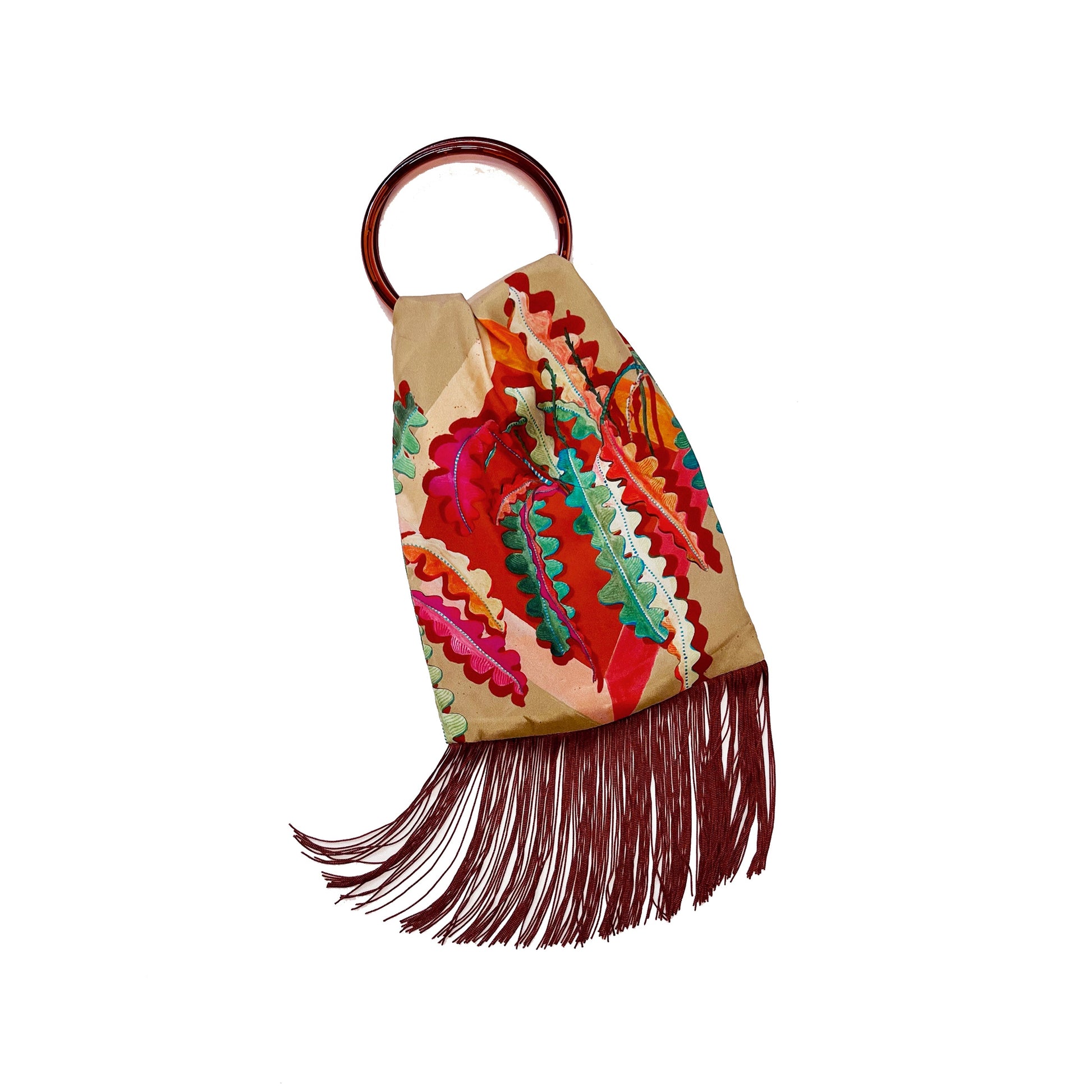 Colorful fabric keychain with fringes on a white background