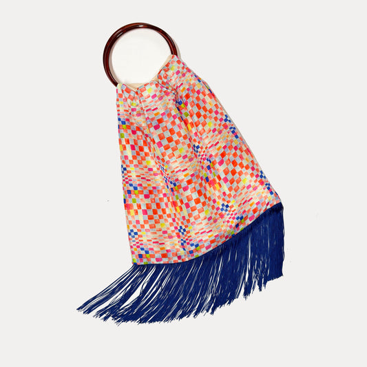 Colorful large silk handbag by Eleni Malami named Talia, featuring vibrant patterns and luxurious fabric with elegant design.