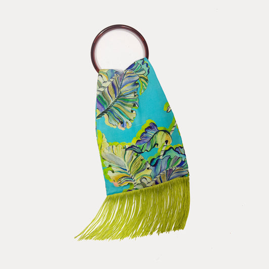 Eleni Malami Ioli Ciel silk luxury handbag with elegant design and smooth fabric, showcased on a plain background.