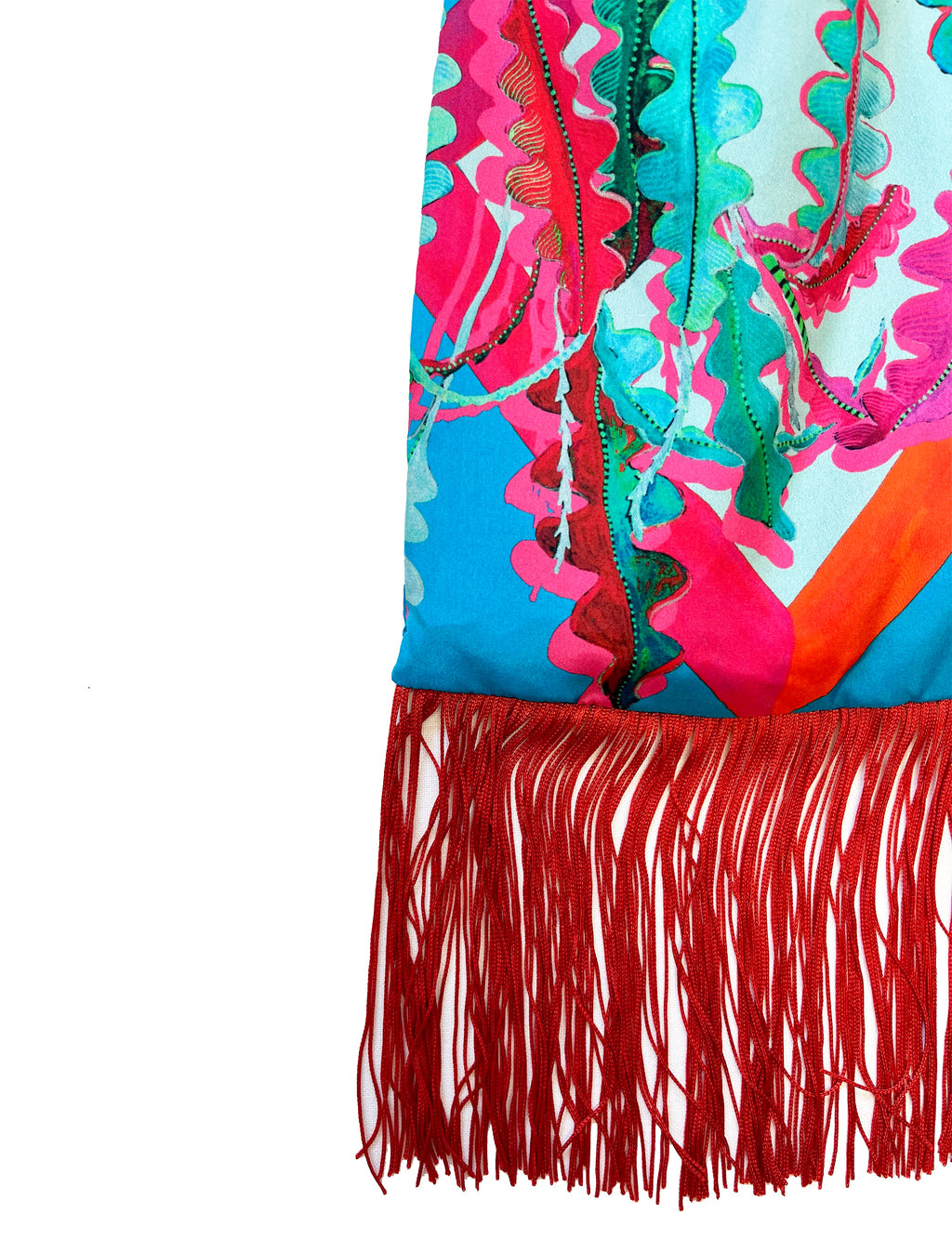 Eleni Malami Fern Cerulean and Scarlet silk fringe handbag with luxurious design, showcasing vibrant colors and elegant craftsmanship.